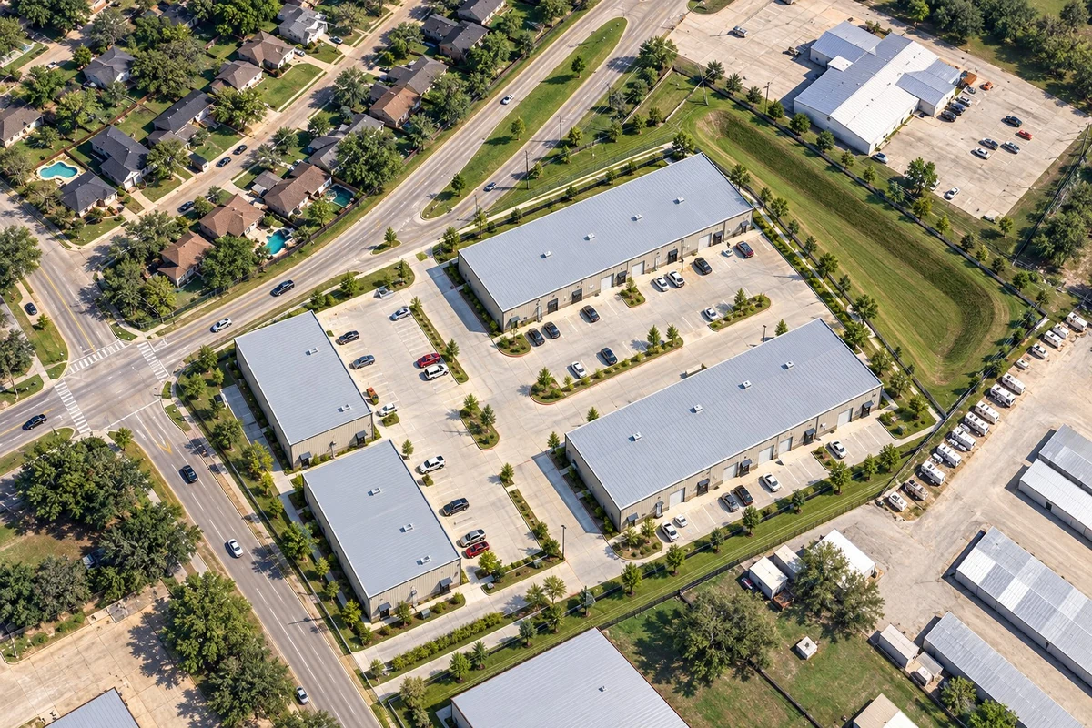 Illustrative aerial rendering of Windsong Business Park showing buildings, parking, landscaping, and detention